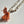 Chapelet bouddhiste tibétain en os gravé avec pompon orange, objet de méditation et culture himalayenne