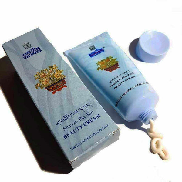 Crème de beauté tibétaine Shasoe-Pae-Kar, soin herbal traditionnel avec emballage et tube ouvert
