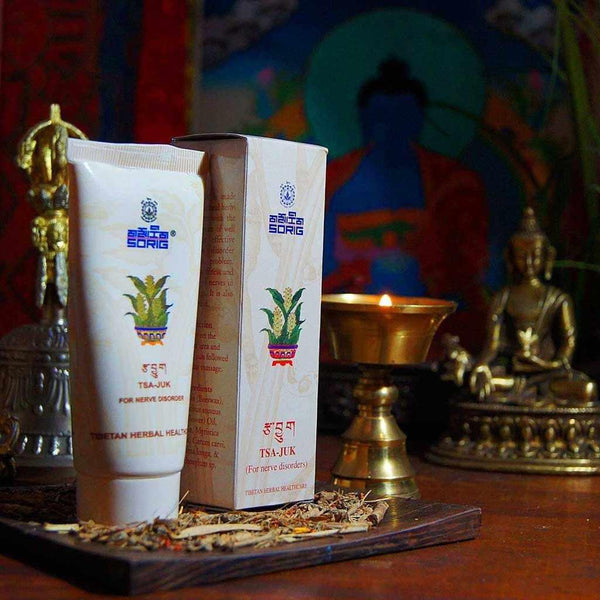 Crème tibétaine TSA-JUK pour troubles nerveux, soins naturels de la médecine tibétaine avec statuettes bouddhistes