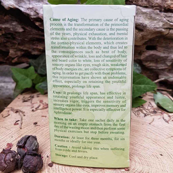 Produit de médecine tibétaine naturelle pour rajeunissement et longévité, avec instructions d'utilisation sur fond bois.