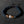 Bracelet bouddhiste en lave et bois avec nœud mystique, symbole de méditation et sagesse tibétaine