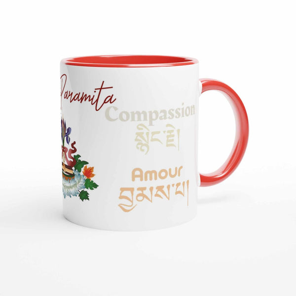 Tasse bouddhiste blanche avec intérieur rouge, inscriptions 'Compassion' et 'Amour' en tibétain, motifs floraux.