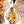 Pendentif bouddhiste doré avec statue de Bouddha, symbole de méditation et philosophie tibétaine
