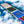 Drapeau de prière tibétain brodé avec symboles bouddhistes et franges colorées sur fond de nuages