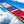 Drapeaux de prière tibétains colorés avec symboles bouddhistes, ciel bleu et nuages