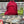 Moine bouddhiste en robe rouge méditant, culture tibétaine et philosophie bouddhiste