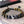 Bracelet bouddhiste avec perles noires gravées d'or, pierres de lave et obsidienne, symboles tibétains