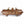 Objet bouddhiste tibétain en métal doré, orné de motifs traditionnels et de figures animales, symbole de la culture himalayenne.