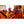 Moines bouddhistes en méditation, robes orange, conférence philosophie tibétaine