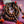 Mala bouddhiste en bois avec perles rouges et tresses orange, symbole de méditation et philosophie tibétaine