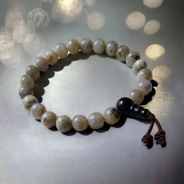 Bracelet de méditation en pierre naturelle avec perle noire, inspiré de la philosophie bouddhiste tibétaine