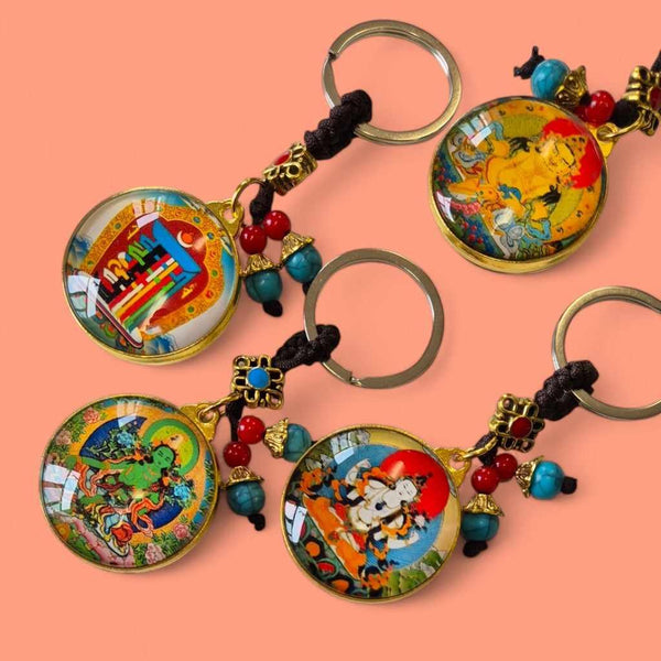 Porte-clés bouddhistes tibétains avec thangkas colorés et perles turquoise