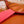 Coussin de méditation tibétain en soie marron avec bordure rouge et motifs brodés